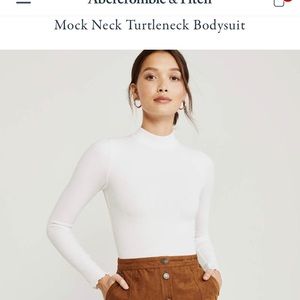 NWT crew neck body suit